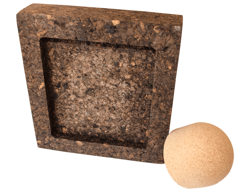 Black cork agglomerate piece and natural colour cork agglomerate piece using 3D machining